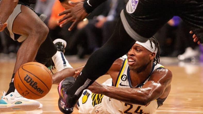 Nov 30, 2022; Sacramento, California, USA; New Orleans Pelicans guard Buddy Hield (24) attempts to pass the ball from the floor during the second quarter of the game against the Sacramento Kings at Golden 1 Center. Mandatory Credit: Ed Szczepanski-USA TODAY Sports
