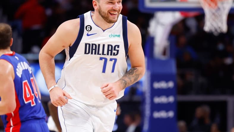 Dec 1, 2022; Detroit, Michigan, USA;  Dallas Mavericks guard Luka Doncic (77) runs up court against the Detroit Pistons at Little Caesars Arena. Mandatory Credit: Rick Osentoski-USA TODAY Sports