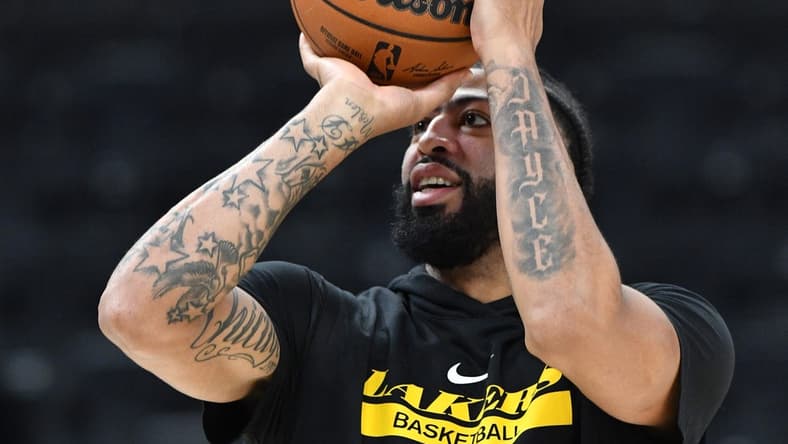 Dec 2, 2022; Milwaukee, Wisconsin, USA; Los Angeles Lakers forward Anthony Davis (3) shoots the ball during pregame warmups at Fiserv Forum. Mandatory Credit: Michael McLoone-USA TODAY Sports