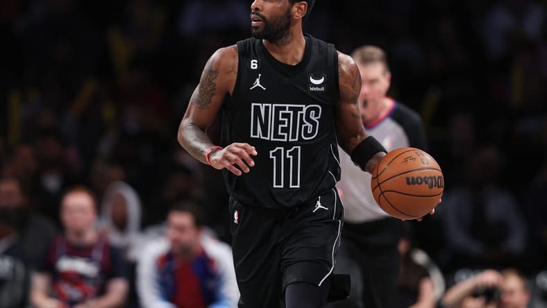 Dec 2, 2022; Brooklyn, New York, USA; Brooklyn Nets guard Kyrie Irving (11) dribbles up court during the second half against the Toronto Raptors at Barclays Center. Mandatory Credit: Vincent Carchietta-USA TODAY Sports