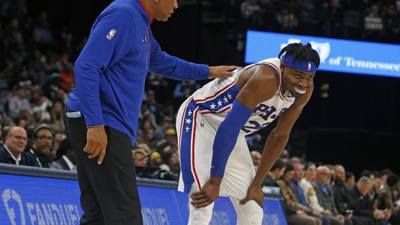 Dec 2, 2022; Memphis, Tennessee, USA; Philadelphia 76ers head coach Doc Rivers (left) talks with Philadelphia 76ers forward Danuel House Jr. (25) after a foul call during the second half at FedExForum. Mandatory Credit: Petre Thomas-USA TODAY Sports