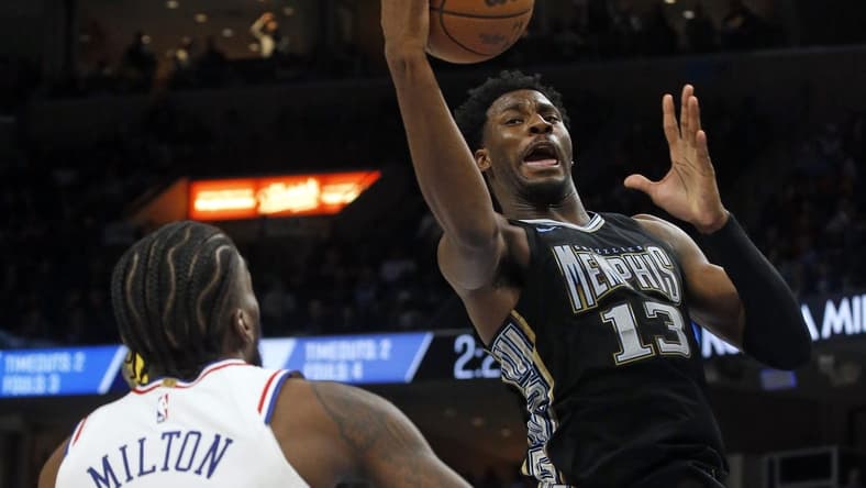 Dec 2, 2022; Memphis, Tennessee, USA; Memphis Grizzlies forward Jaren Jackson Jr. (13) collects a rebound during the second half against the Philadelphia 76ers at FedExForum. Mandatory Credit: Petre Thomas-USA TODAY Sports