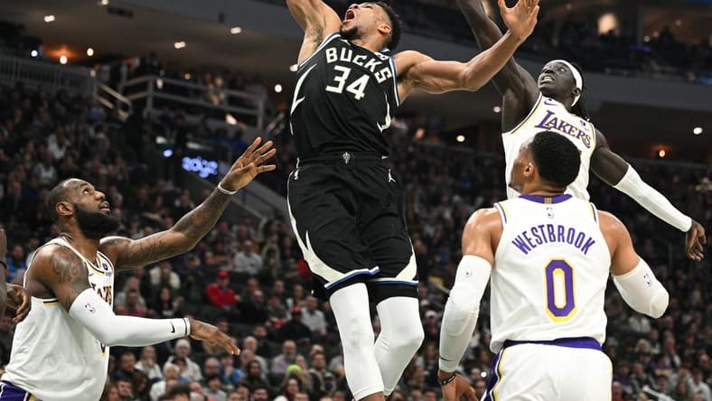 Dec 2, 2022; Milwaukee, Wisconsin, USA; Milwaukee Bucks forward Giannis Antetokounmpo (34) dunks the ball against Los Angeles Lakers at Fiserv Forum. Mandatory Credit: Michael McLoone-USA TODAY Sports