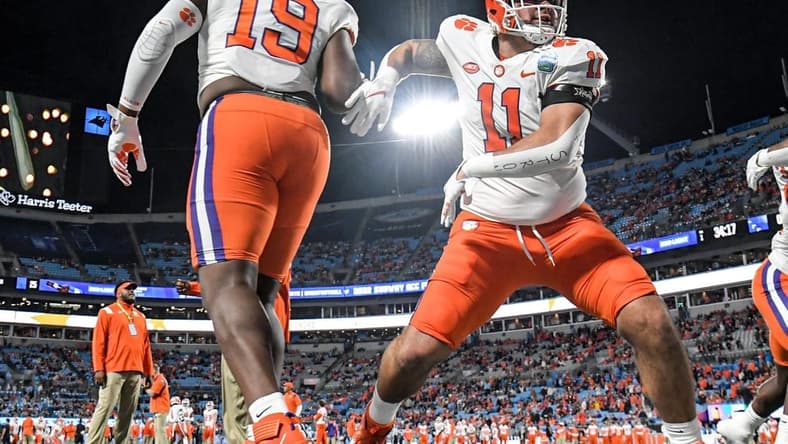 Dec 3, 2022; Charlotte, NC, USA; Clemson Tigers defensive lineman Bryan Bresee (11) warms up with defensive lineman DeMonte Capehart (19) before the ACC Championship game against the North Carolina Tar Heels at Bank of America Stadium. Mandatory Credit: Ken Ruinard-USA TODAY NETWORK