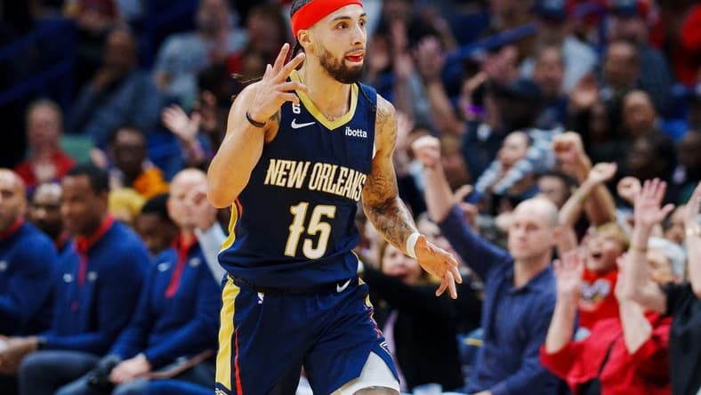Dec 4, 2022; New Orleans, Louisiana, USA; New Orleans Pelicans guard Jose Alvarado (15) reacts to a three point shot during the second quarter against the Denver Nuggets at Smoothie King Center. Mandatory Credit: Andrew Wevers-USA TODAY Sports