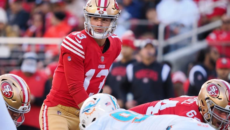 Dec 4, 2022; Santa Clara, California, USA; San Francisco 49ers quarterback Brock Purdy (13) prepares for the snap against the Miami Dolphins during the first quarter at Levi's Stadium. Mandatory Credit: Kelley L Cox-USA TODAY Sports