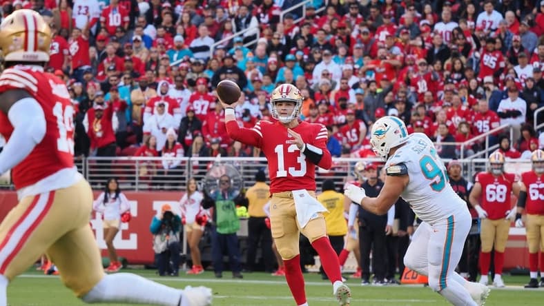 Dec 4, 2022; Santa Clara, California, USA; San Francisco 49ers quarterback Brock Purdy (13) throws the ball against Miami Dolphins defensive end Zach Sieler (92) during the first quarter at Levi's Stadium. Mandatory Credit: Kelley L Cox-USA TODAY Sports