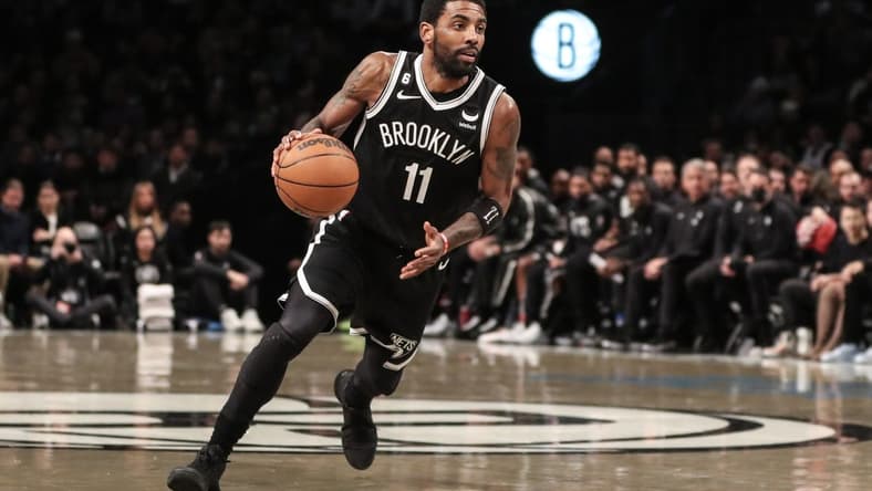 Dec 4, 2022; Brooklyn, New York, USA; Brooklyn Nets guard Kyrie Irving (11) drives to the basket in the third quarter against the Boston Celtics at Barclays Center. Mandatory Credit: Wendell Cruz-USA TODAY Sports