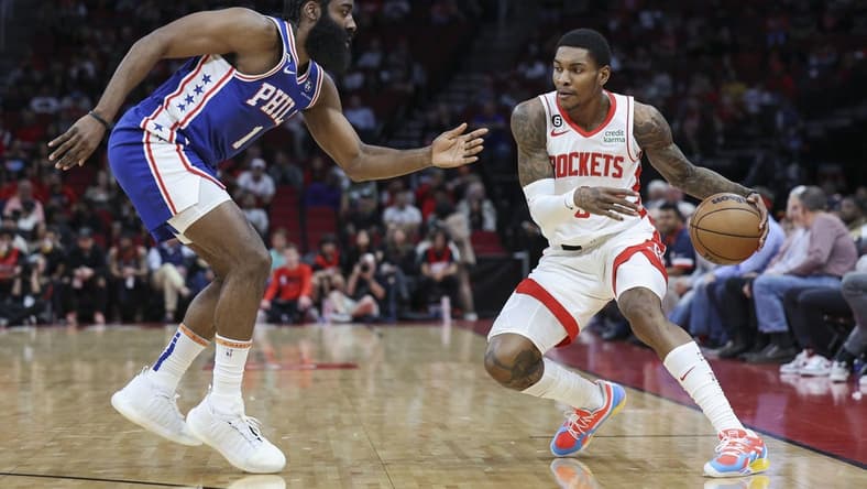 Dec 5, 2022; Houston, Texas, USA; Houston Rockets guard Kevin Porter Jr. (3) controls the ball as Philadelphia 76ers guard James Harden (1) defends during the first quarter at Toyota Center. Mandatory Credit: Troy Taormina-USA TODAY Sports