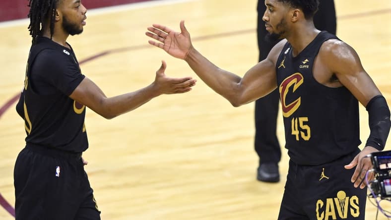 Dec 6, 2022; Cleveland, Ohio, USA; Cleveland Cavaliers guard Darius Garland (10) and guard Donovan Mitchell (45) celebrate in the fourth quarter against the Los Angeles Lakers at Rocket Mortgage FieldHouse. Mandatory Credit: David Richard-USA TODAY Sports
