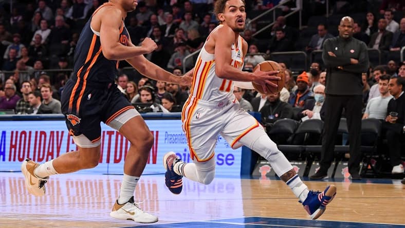 Dec 7, 2022; New York, New York, USA;   Atlanta Hawks guard Trae Young (11) drives to the basket on New York Knicks guard Quentin Grimes (6) during the first quarter at Madison Square Garden. Mandatory Credit: Dennis Schneidler-USA TODAY Sports