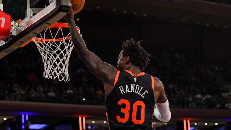 Dec 7, 2022; New York, New York, USA; New York Knicks forward Julius Randle (30) attempts a lay up against the Atlanta Hawks during the third quarter at Madison Square Garden. Mandatory Credit: Dennis Schneidler-USA TODAY Sports