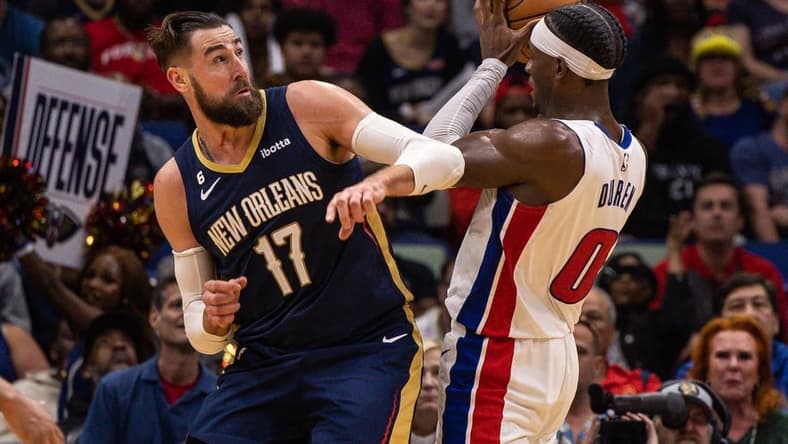 Dec 7, 2022; New Orleans, Louisiana, USA; Detroit Pistons center Jalen Duren (0) grabs a rebound against New Orleans Pelicans center Jonas Valanciunas (17) during the second half at Smoothie King Center. Mandatory Credit: Stephen Lew-USA TODAY Sports