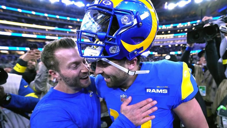 Dec 8, 2022; Inglewood, California, USA; Los Angeles Rams coach Sean McVay (left) and quarterback Baker Mayfield (17) celebrate after the game against the Las Vegas Raiders at SoFi Stadium. Mandatory Credit: Kirby Lee-USA TODAY Sports
