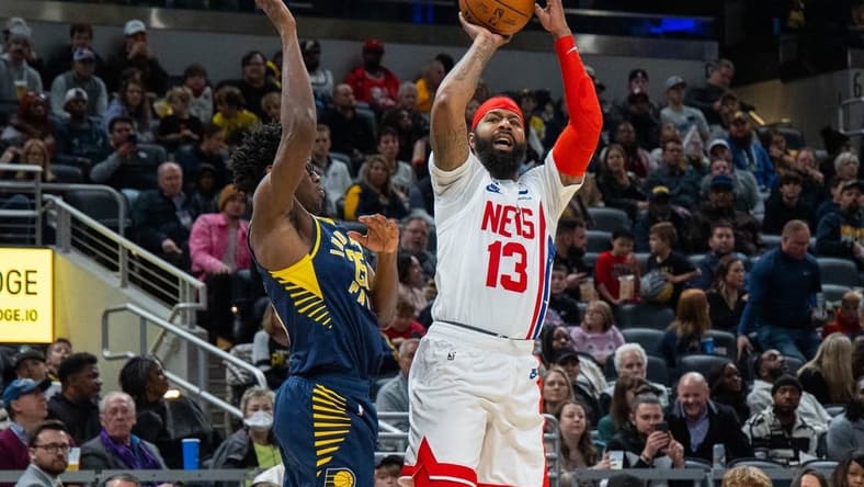 Dec 10, 2022; Indianapolis, Indiana, USA; Brooklyn Nets forward Markieff Morris (13) shoots the ball against Indiana Pacers forward Jalen Smith (25) in the second half at Gainbridge Fieldhouse. Mandatory Credit: Trevor Ruszkowski-USA TODAY Sports