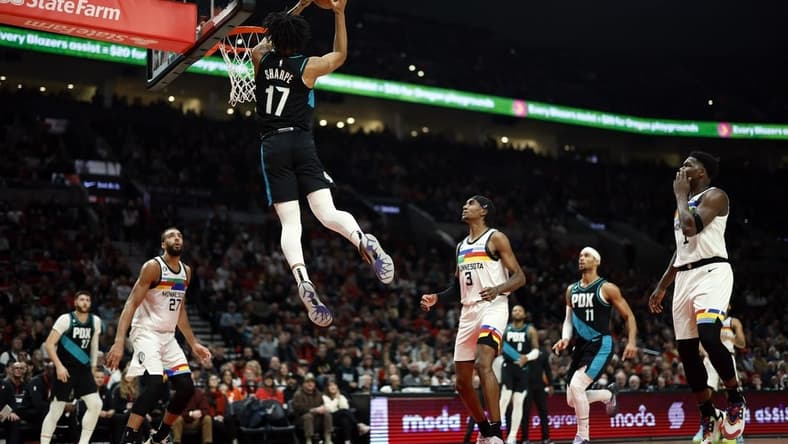 Dec 10, 2022; Portland, Oregon, USA; Portland Trail Blazers shooting guard Shaedon Sharpe (17) dunks the ball during the first half against the Minnesota Timberwolves at Moda Center. Mandatory Credit: Soobum Im-USA TODAY Sports
