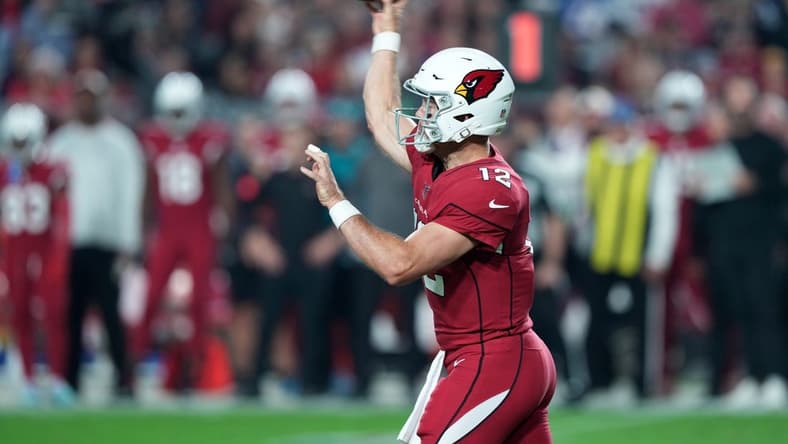 Dec 12, 2022; Glendale, Arizona, USA; Arizona Cardinals quarterback Colt McCoy (12) throws a pass against the New England Patriots during the first half at State Farm Stadium. Mandatory Credit: Joe Camporeale-USA TODAY Sports