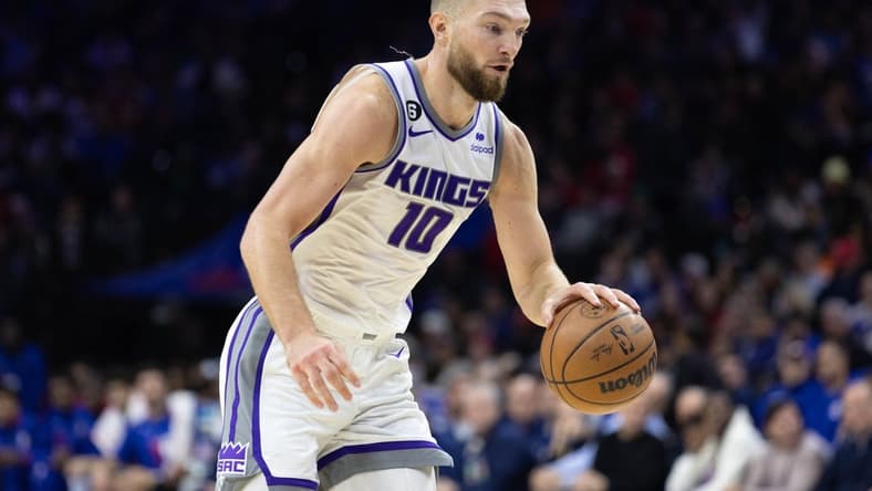 Dec 13, 2022; Philadelphia, Pennsylvania, USA; Sacramento Kings forward Domantas Sabonis (10) dribbles the ball against the Philadelphia 76ers during the second quarter at Wells Fargo Center. Mandatory Credit: Bill Streicher-USA TODAY Sports