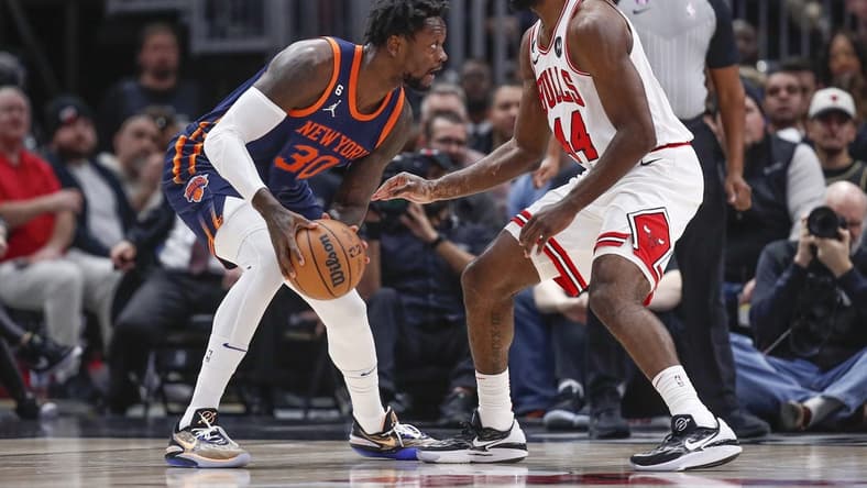 Dec 14, 2022; Chicago, Illinois, USA; Chicago Bulls forward Patrick Williams (44) defends against New York Knicks forward Julius Randle (30) during the first half at United Center. Mandatory Credit: Kamil Krzaczynski-USA TODAY Sports