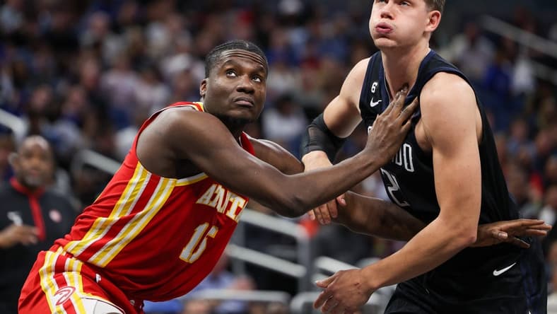 Dec 14, 2022; Orlando, Florida, USA; Atlanta Hawks center Clint Capela (15) boxes out Orlando Magic center Moritz Wagner (21) in the fourth quarter at Amway Center. Mandatory Credit: Nathan Ray Seebeck-USA TODAY Sports