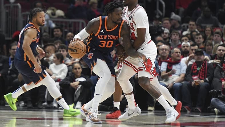 Dec 16, 2022; Chicago, Illinois, USA;  New York Knicks forward Julius Randle (30) dribbles against Chicago Bulls forward Javonte Green (24) during the first half at the United Center. Mandatory Credit: Matt Marton-USA TODAY Sports