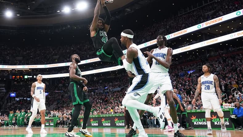 Dec 16, 2022; Boston, Massachusetts, USA; Boston Celtics center Robert Williams III (44) makes the basket against the Orlando Magic in the second half at TD Garden. Mandatory Credit: David Butler II-USA TODAY Sports