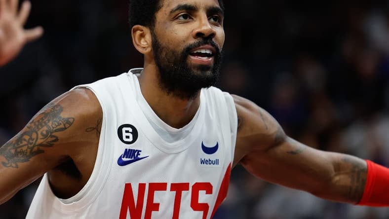Dec 18, 2022; Detroit, Michigan, USA;  Brooklyn Nets guard Kyrie Irving (11) against the Detroit Pistons at Little Caesars Arena. Mandatory Credit: Rick Osentoski-USA TODAY Sports