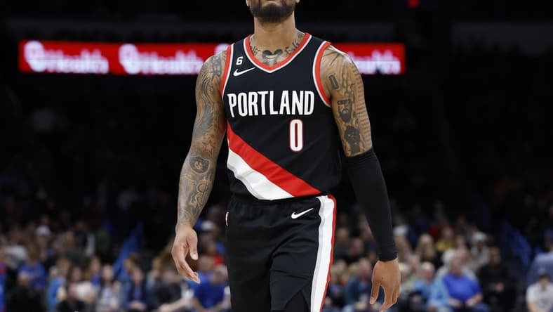 Dec 19, 2022; Oklahoma City, Oklahoma, USA; Portland Trail Blazers guard Damian Lillard (0) looks at the score board during a time out against the Oklahoma City Thunder in the first quarter at Paycom Center. Mandatory Credit: Alonzo Adams-USA TODAY Sports
