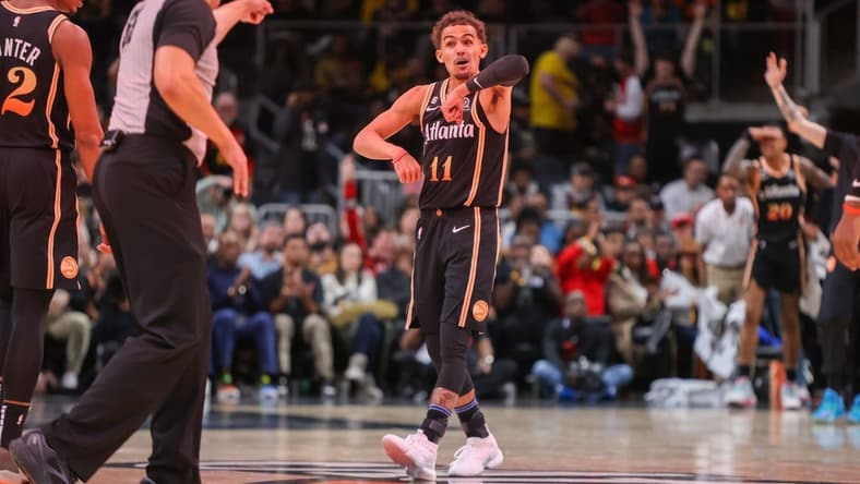 Dec 19, 2022; Atlanta, Georgia, USA; Atlanta Hawks guard Trae Young (11) reacts after being called for a technical foul against the Orlando Magic in the second half at State Farm Arena. Mandatory Credit: Brett Davis-USA TODAY Sports
