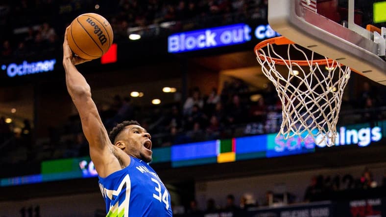 Dec 19, 2022; New Orleans, Louisiana, USA; Milwaukee Bucks forward Giannis Antetokounmpo (34) dunks the ball against New Orleans Pelicans guard Dyson Daniels (11) during the second half at Smoothie King Center. Mandatory Credit: Stephen Lew-USA TODAY Sports