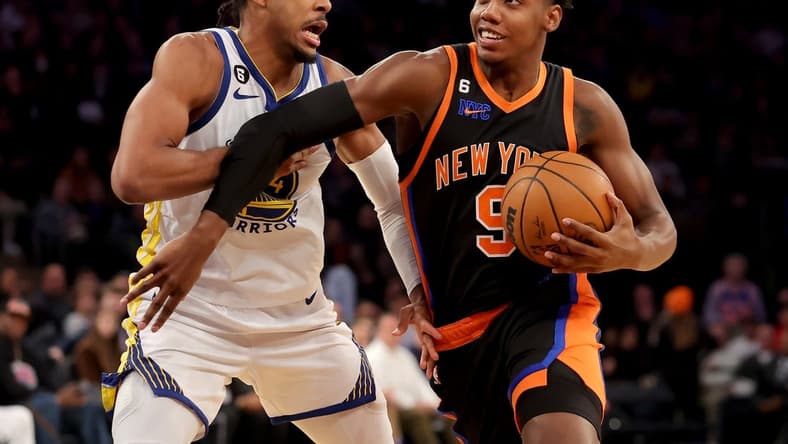 Dec 20, 2022; New York, New York, USA; New York Knicks guard RJ Barrett (9) drives to the basket against Golden State Warriors guard Moses Moody (4) during the third quarter at Madison Square Garden. Mandatory Credit: Brad Penner-USA TODAY Sports
