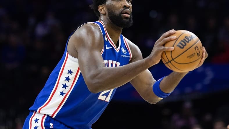 Dec 21, 2022; Philadelphia, Pennsylvania, USA; Philadelphia 76ers center Joel Embiid (21) attempts a three pointer against the Detroit Pistons during the third quarter at Wells Fargo Center. Mandatory Credit: Bill Streicher-USA TODAY Sports