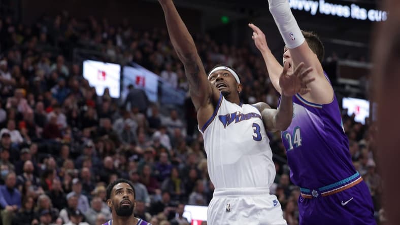 Dec 22, 2022; Salt Lake City, Utah, USA; Washington Wizards guard Bradley Beal (3) tries to keep Utah Jazz center Walker Kessler (24) away from the ball while shooting during the second half at Vivint Arena. Mandatory Credit: Chris Nicoll-USA TODAY Sports