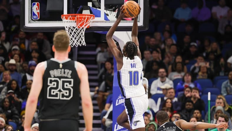Dec 23, 2022; Orlando, Florida, USA; Orlando Magic center Bol Bol (10) goes to the basket during the second quarter against the San Antonio Spurs at Amway Center. Mandatory Credit: Mike Watters-USA TODAY Sports