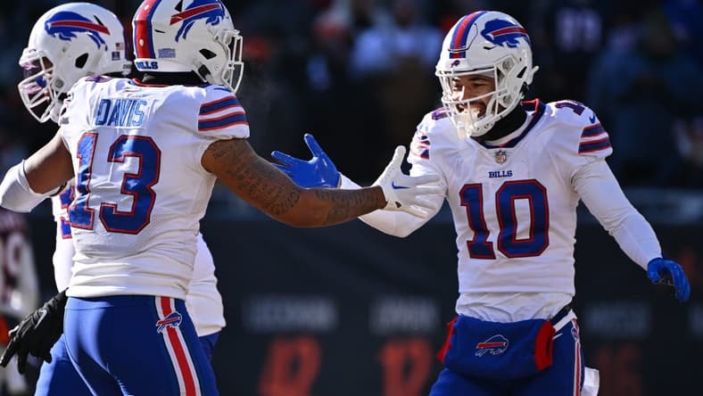 Dec 24, 2022; Chicago, Illinois, USA; Buffalo Bills wide receiver Khalil Shakir (10) celebrates with wide receiver Gabe Davis (13) after scoring a successful two-point try in the third quarter against the Chicago Bears at Soldier Field. Buffalo defeated Chicago 35-13. Mandatory Credit: Jamie Sabau-USA TODAY Sports
