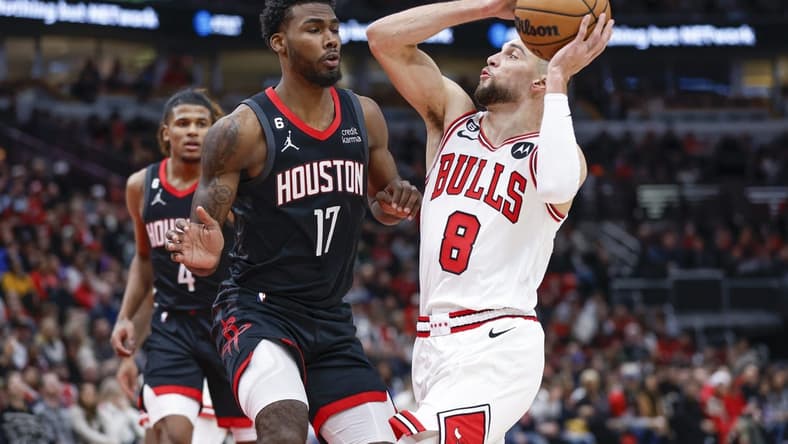 Dec 26, 2022; Chicago, Illinois, USA; Chicago Bulls guard Zach LaVine (8) drives to the basket against Houston Rockets forward Tari Eason (17) during the first half at United Center. Mandatory Credit: Kamil Krzaczynski-USA TODAY Sports