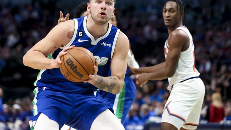 Dec 27, 2022; Dallas, Texas, USA; Dallas Mavericks guard Luka Doncic (77) looks to pass during the second half against the New York Knicks at American Airlines Center. Mandatory Credit: Kevin Jairaj-USA TODAY Sports