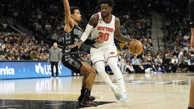 Dec 29, 2022; San Antonio, Texas, USA; New York Knicks forward Julius Randle (30) drives to the basket against San Antonio Spurs guard Tre Jones (33) during the second half at AT&T Center. Mandatory Credit: Scott Wachter-USA TODAY Sports