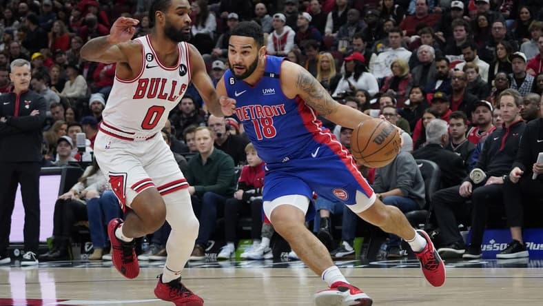 Dec 30, 2022; Chicago, Illinois, USA; Chicago Bulls guard Coby White (0) defends Detroit Pistons center Isaiah Stewart (28) during the first quarter at United Center. Mandatory Credit: David Banks-USA TODAY Sports