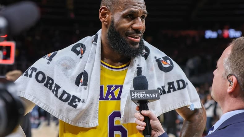 Dec 30, 2022; Atlanta, Georgia, USA; Los Angeles Lakers forward LeBron James (6) does an interview after a victory against the Atlanta Hawks at State Farm Arena. Mandatory Credit: Brett Davis-USA TODAY Sports