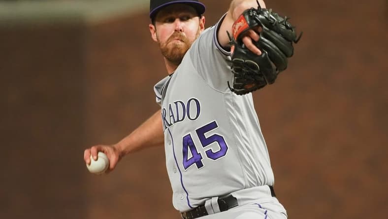 Jun 24, 2019; San Francisco, CA, USA; Colorado Rockies relief pitcher Scott Oberg (45) pitches the ball against the San Francisco Giants during the eighth inning at Oracle Park. Mandatory Credit: Kelley L Cox-USA TODAY Sports