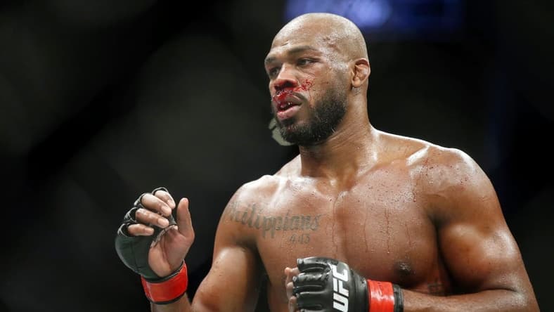 Feb 8, 2020; Houston, Texas, USA; Jon Jones (red gloves) fights Dominick Reyes (not pictured) during UFC 247 at Toyota Center. Mandatory Credit: Thomas Shea-USA TODAY Sports