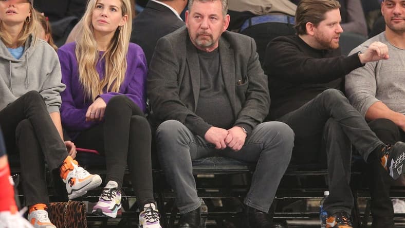 Feb 12, 2020; New York, New York, USA; New York Knicks executive chairman James Dolan (center) watches the game during the first quarter against the Washington Wizards at Madison Square Garden. Mandatory Credit: Brad Penner-USA TODAY Sports