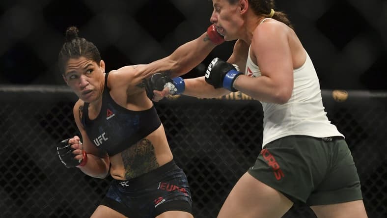 May 13, 2020; Jacksonville, Florida, USA; Sijara Eubanks (red gloves) fights Sarah Moras (blue gloves) during UFC Fight Night at VyStar Veterans Memorial Arena. Mandatory Credit: Jasen Vinlove-USA TODAY Sports