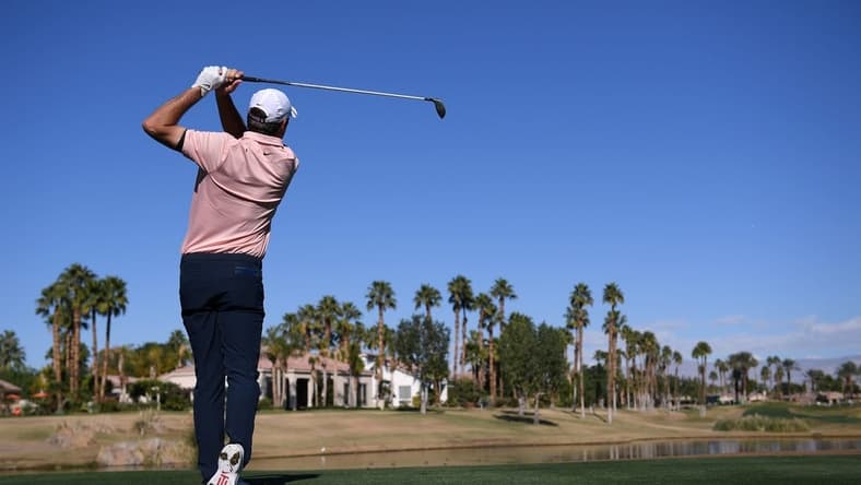 Jan 21, 2022; La Quinta, California, USA; Scottie Scheffler plays his shot from the 13th tee during the second round of the American Express golf tournament at Nicklaus Tournament Course. Mandatory Credit: Orlando Ramirez-USA TODAY Sports