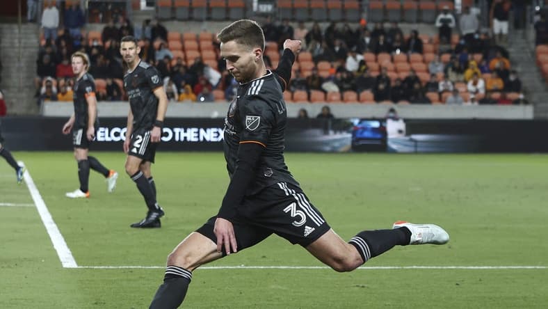 Feb 27, 2022; Houston, Texas, USA; Houston Dynamo FC defender Adam Lundkvist (3) kicks the ball during the second half against the Real Salt Lake at PNC Stadium. Mandatory Credit: Troy Taormina-USA TODAY Sports