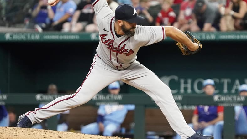 May 1, 2022; Arlington, Texas, USA; Atlanta Braves relief pitcher Darren O'Day (56) throws to the plate during the seventh inning against the Texas Rangers at Globe Life Field. Mandatory Credit: Raymond Carlin III-USA TODAY Sports
