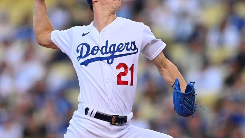 May 13, 2022; Los Angeles, California, USA;  Los Angeles Dodgers starting pitcher Walker Buehler (21) pitches in the second inning against the Philadelphia Phillies at Dodger Stadium. Mandatory Credit: Jayne Kamin-Oncea-USA TODAY Sports