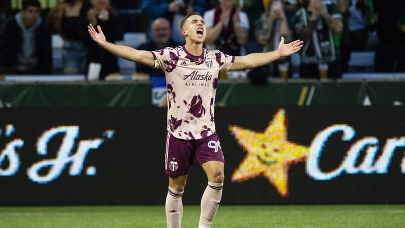 May 14, 2022; Portland, Oregon, USA; Portland Timbers forward Nathan Fogaca (99) celebrates during the second half after scoring a goal against Sporting Kansas City at Providence Park. The Timbers won 7-2.  Mandatory Credit: Troy Wayrynen-USA TODAY Sports