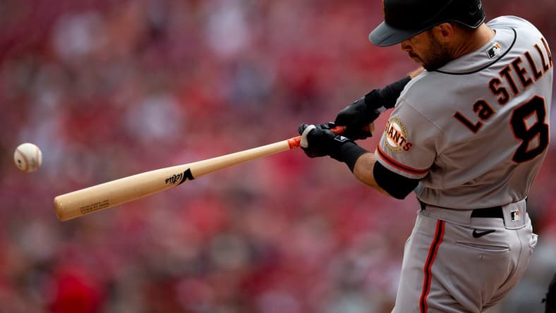 San Francisco Giants second baseman Tommy La Stella (8) hits a double in the first inning of the MLB game between the Cincinnati Reds and the San Francisco Giants at Great American Ball Park in Cincinnati, Saturday, May 28, 2022.

San Francisco Giants At Cincinnati Reds